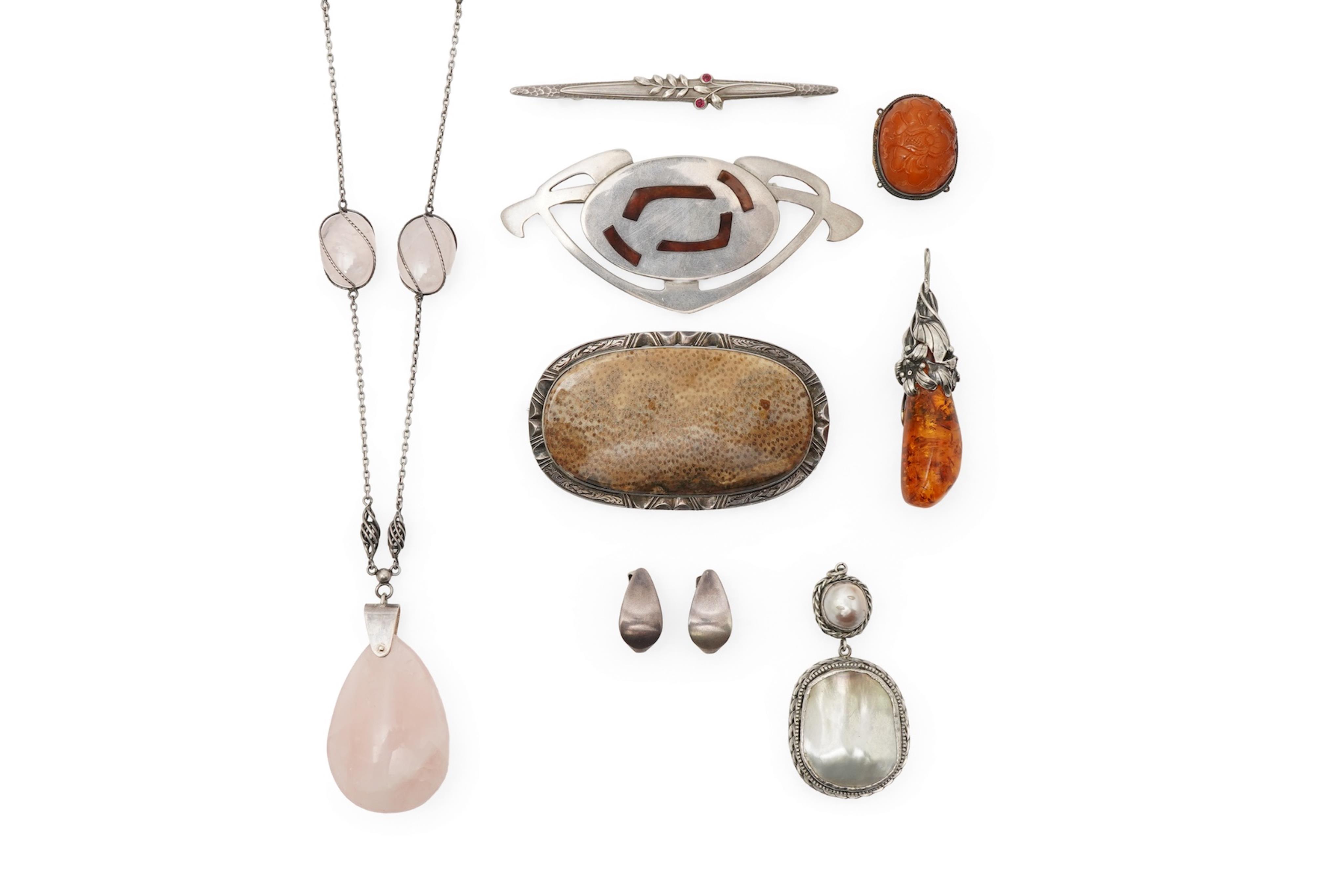 A collection of Arts & Crafts jewels including a pair of silver earrings by Georg Jensen